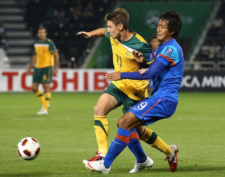 Central defender Gouramangi Singh tackles an Australian player.