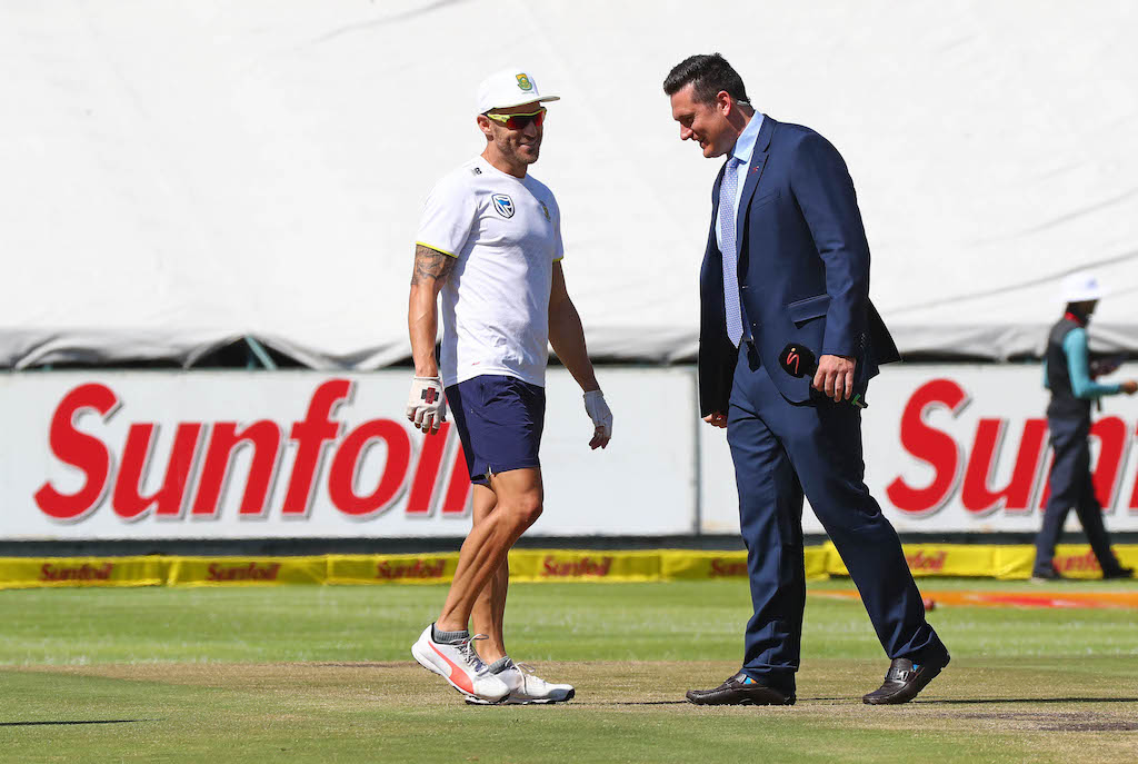 Faf du Plessis and Graeme Smith sharing a light moment on the field. (File photo)