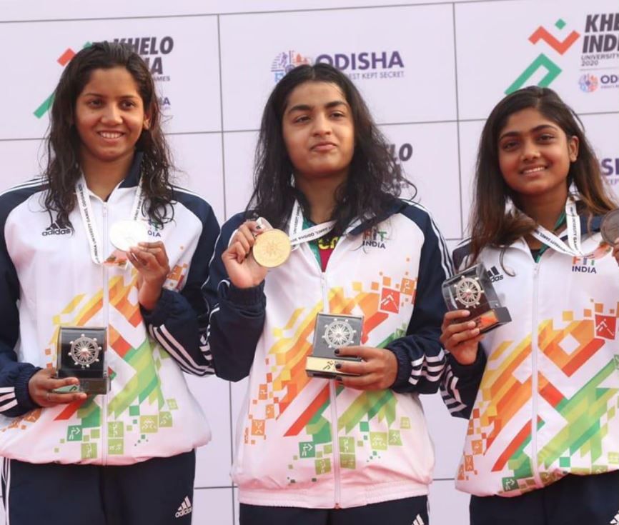 Swimmer Sadhvi Dhuri of Pune University posed with the gold medal.