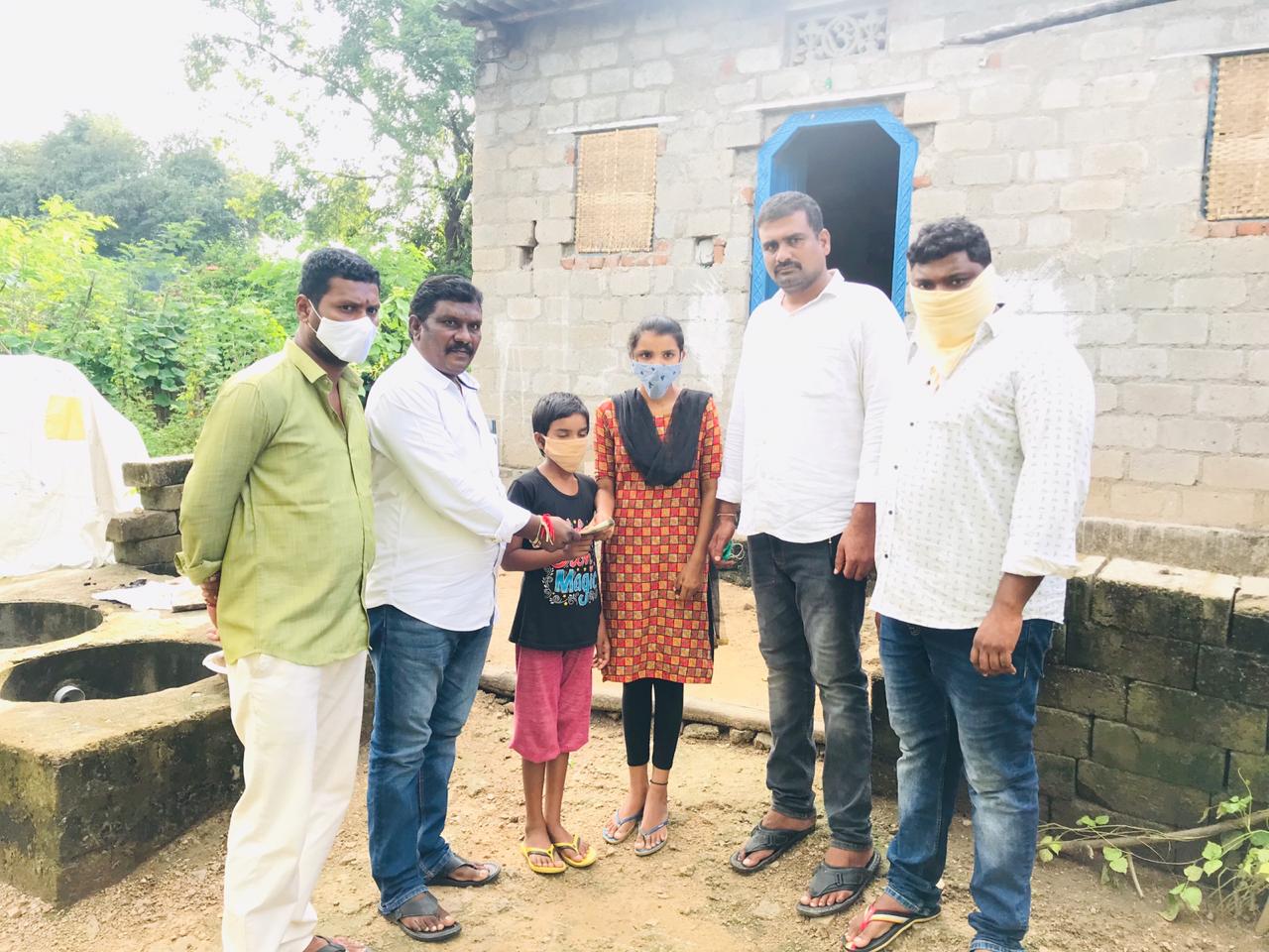 BJP councilor Bera Satyanarayana provided financial assistance to orphaned children in Chandaram village, Manchiryala District