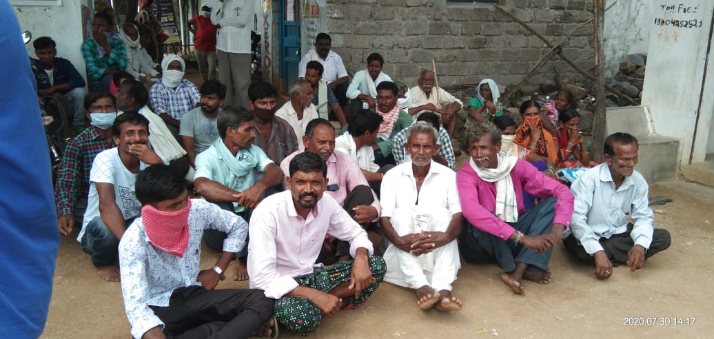 protest by farmers against officer for taking bribe