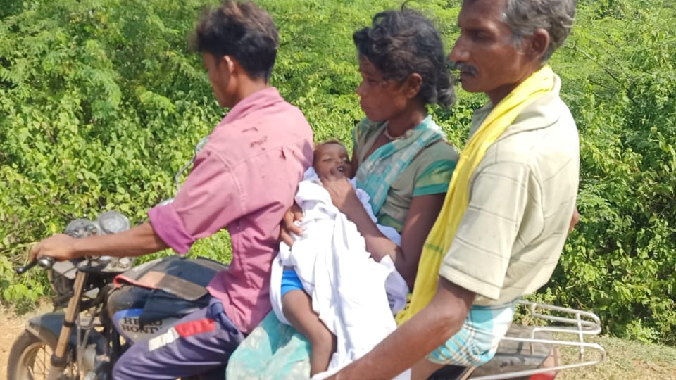 Adivasi man takes daughter body on bike