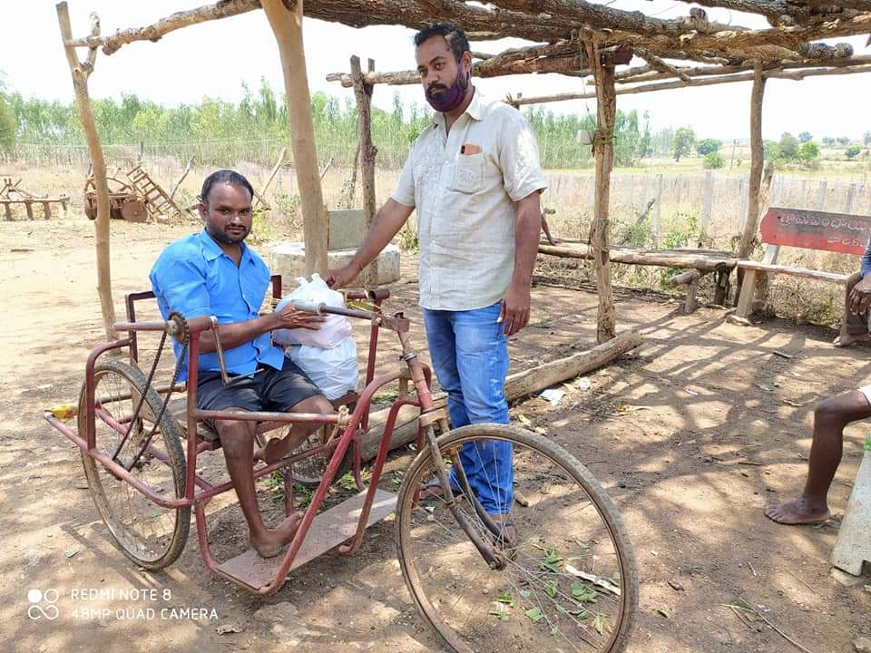 YOUNG BOY HELPING TO POOR AND NEEDY PEOPLE IN ILLANDHU