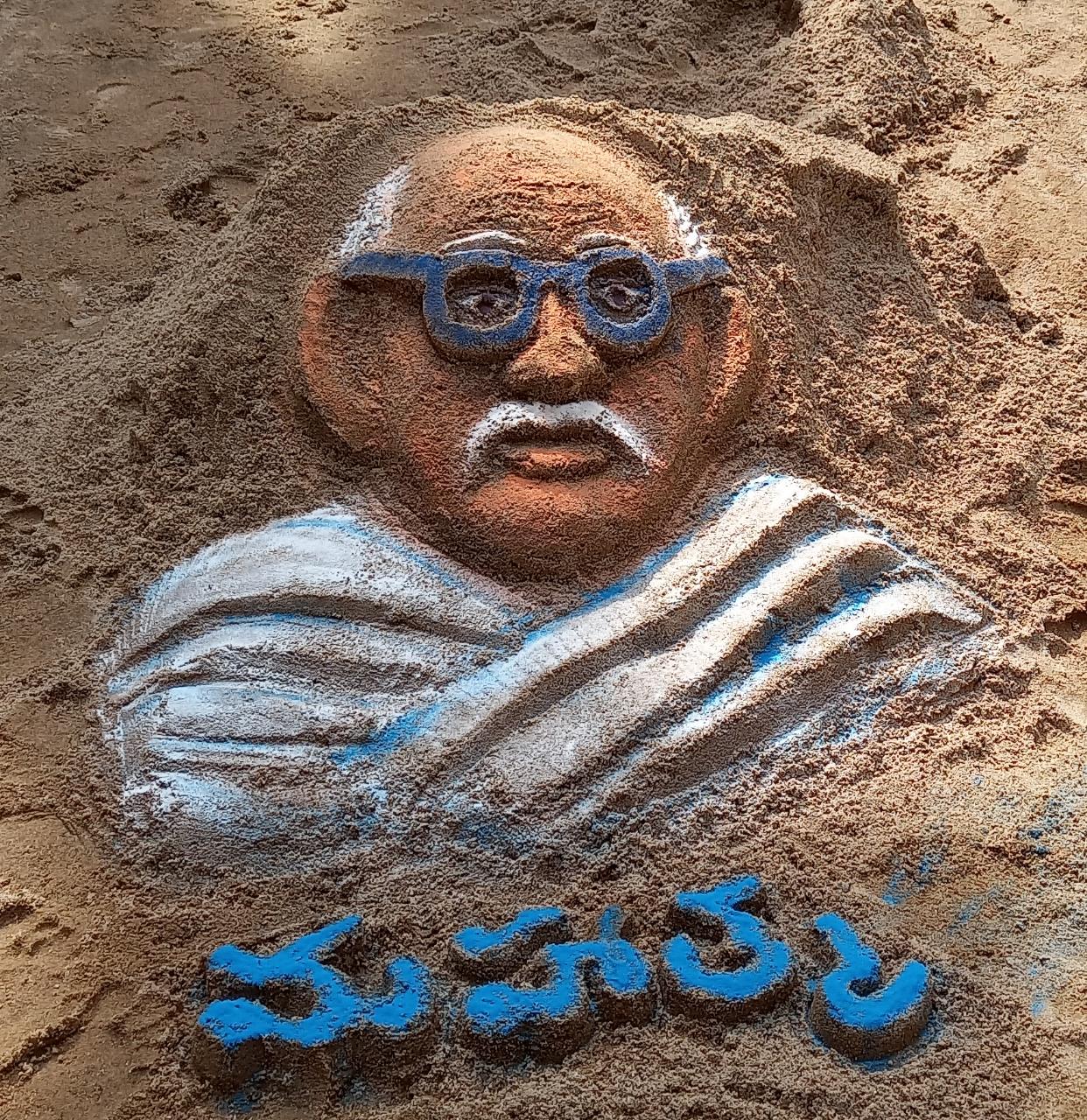 Mahatma Saikata sculpture on sand