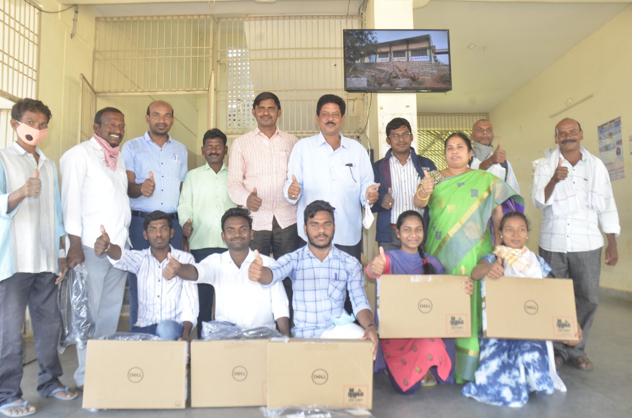 Mahabubabad District Collector Gautam distributed laptops to six SC students