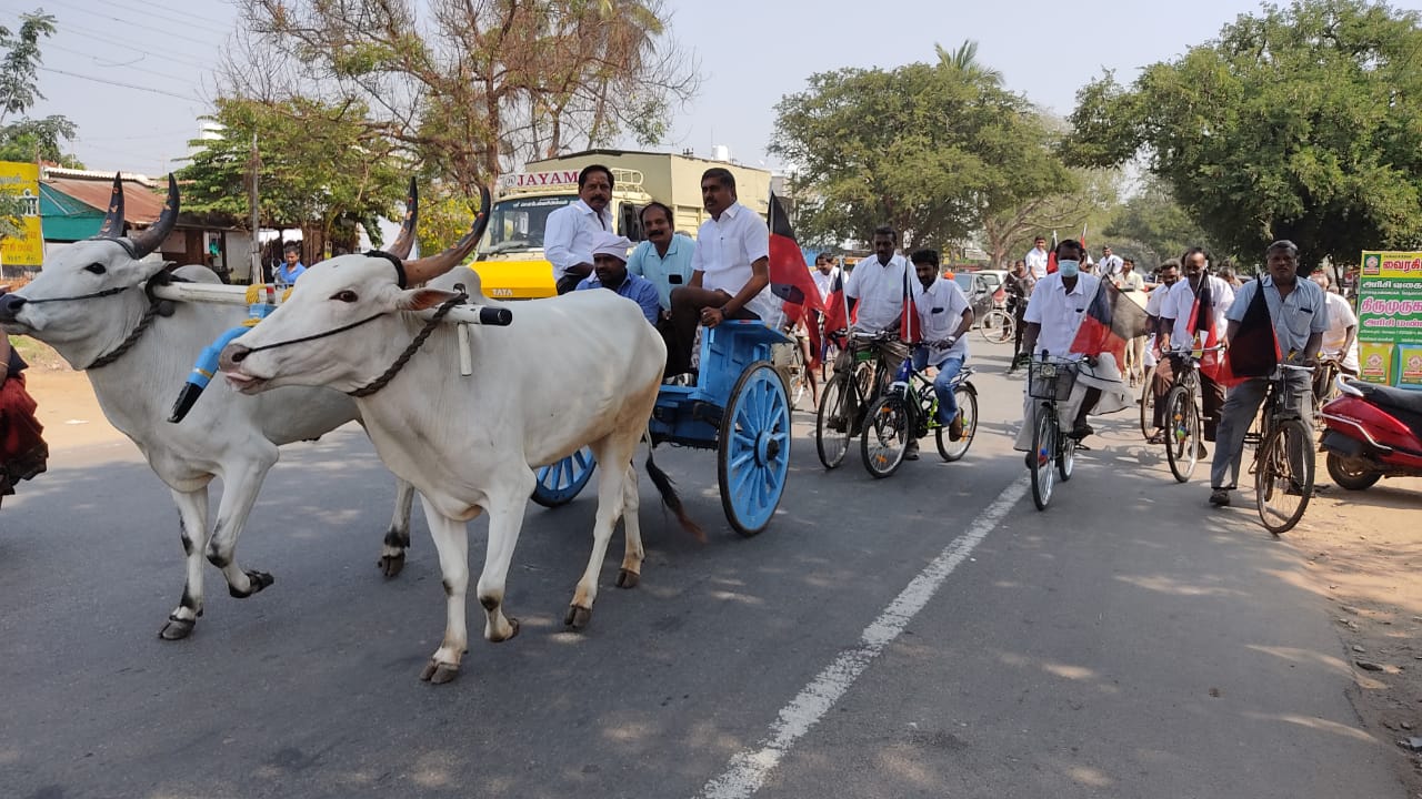 dmk cycle rickshaw cattle rally in covai condemning petrol and diesel price hike