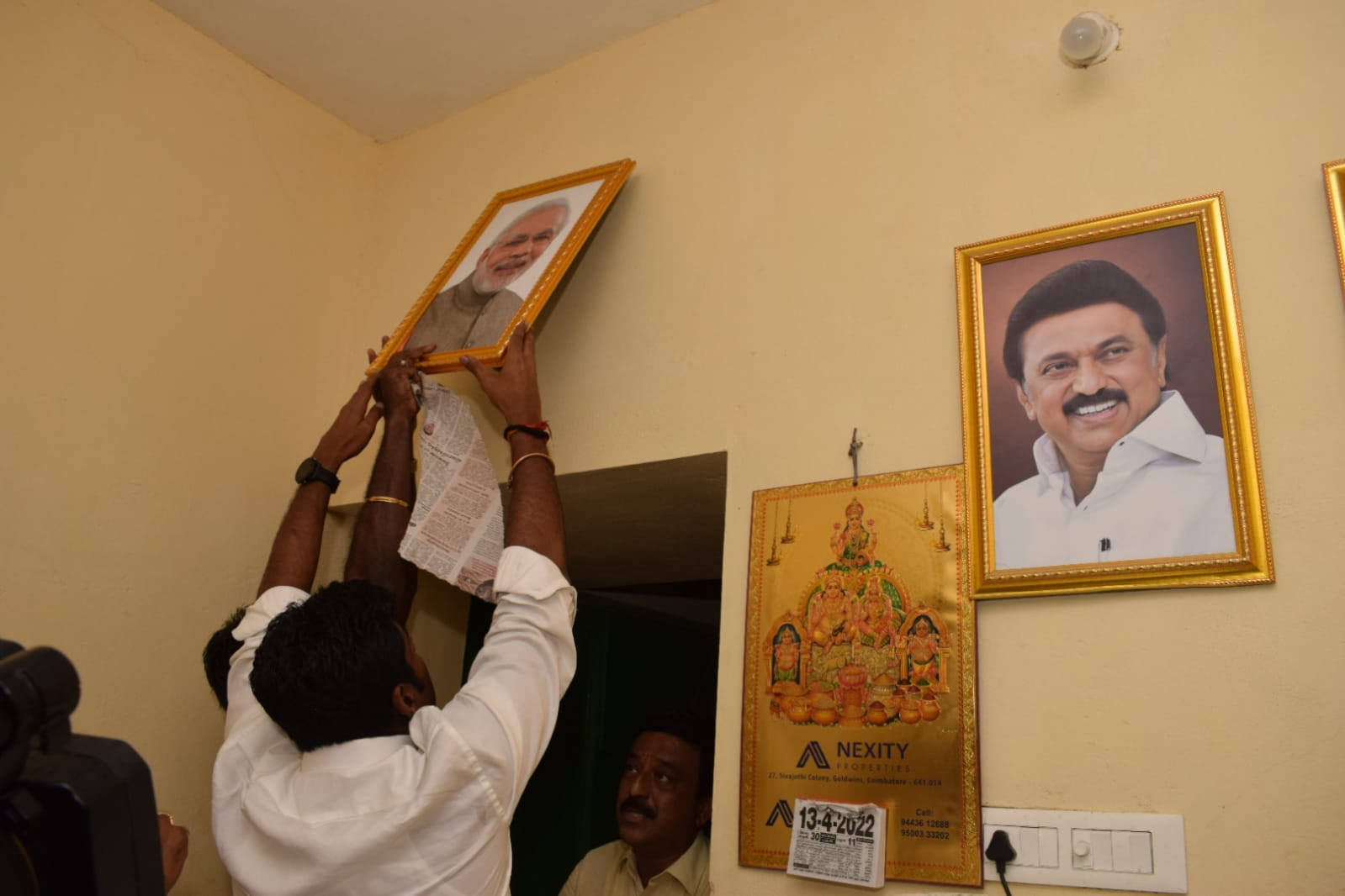 Modi's photo hangs up in Ration shop