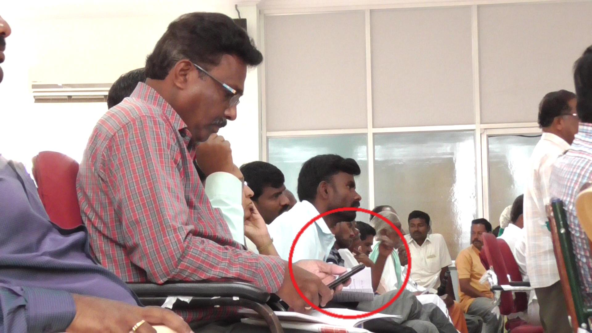 dharmapuri govt employees sleeping and chatting in phones in farmer grievance meet