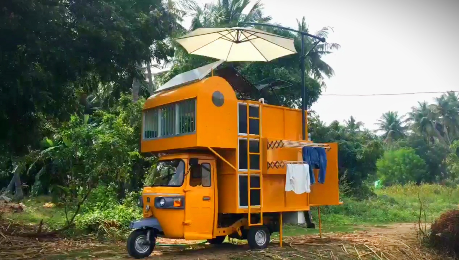 An auto rickshaw transformed into a mobile home