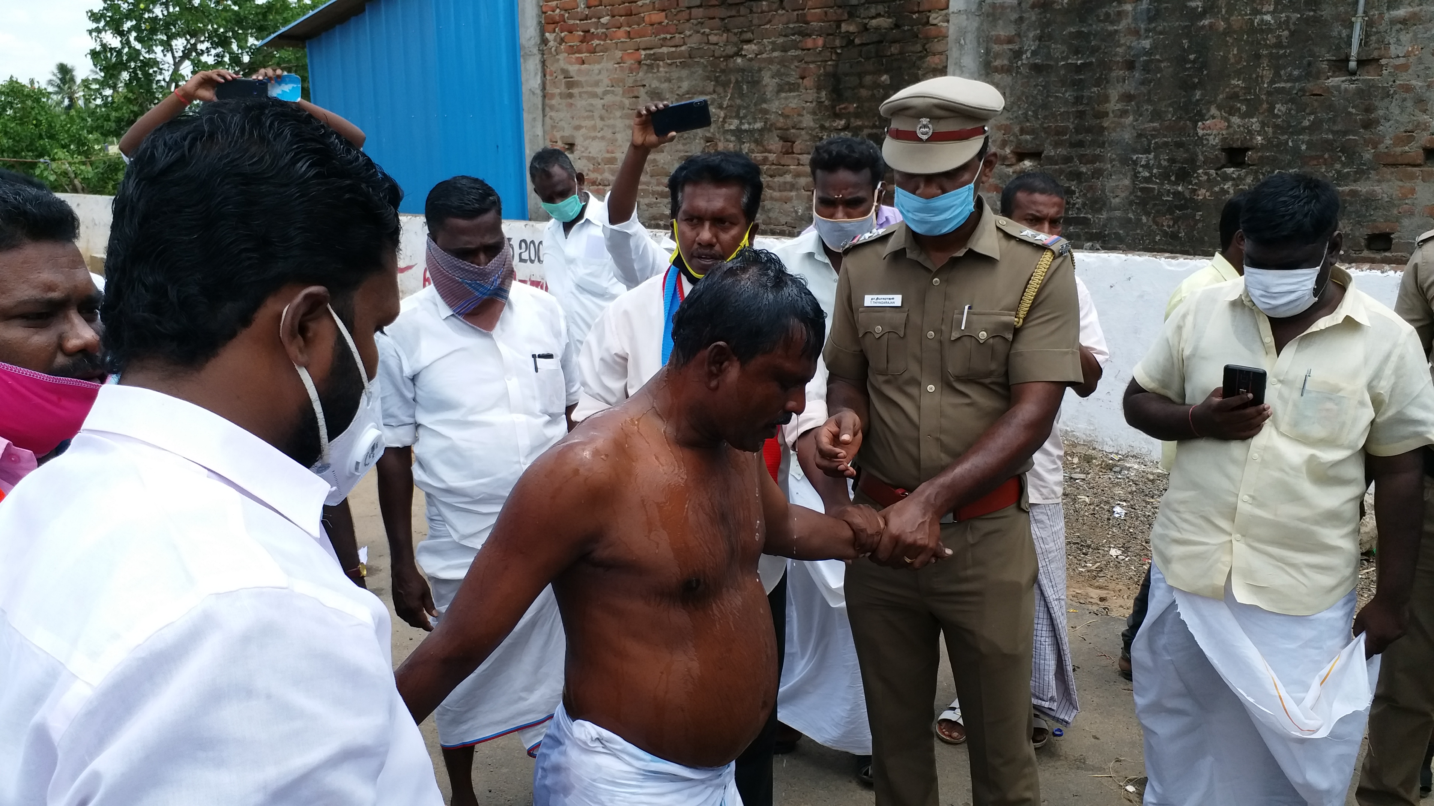 vck partty member self immolation as police