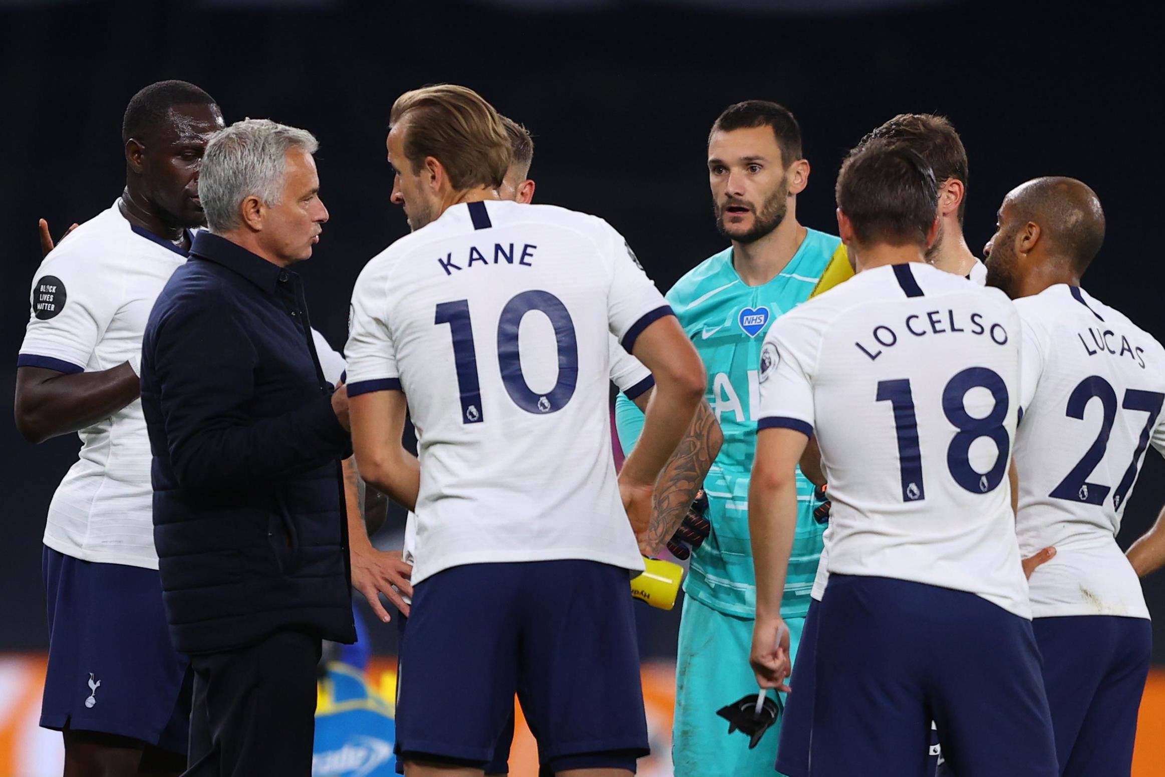 Jose Mourinho with Tottenham players.