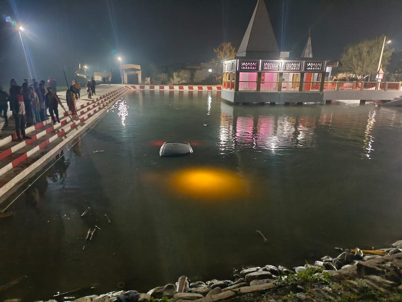 car fell into pond