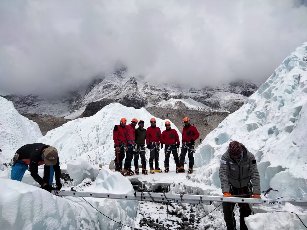 The team waiting to cross the dangerous Khumbu icefall.