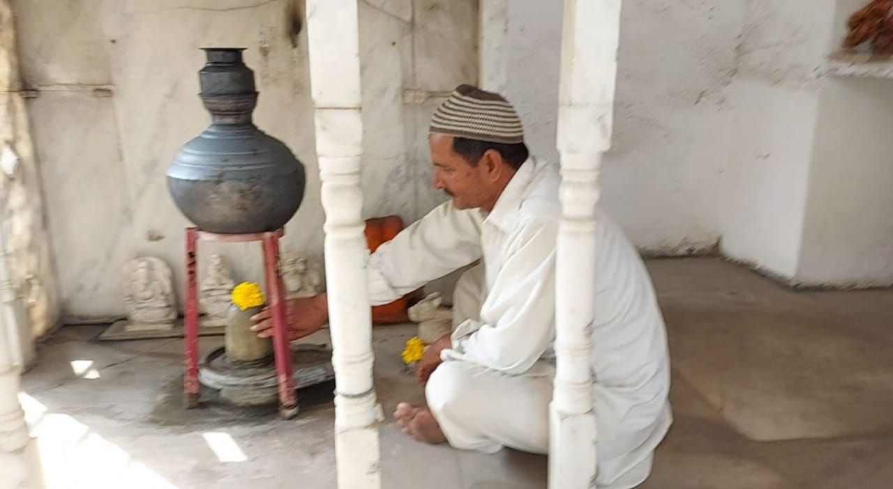 Muslim man lit diyas at a temple in Shopian area of Jammu and Kashmir on Thursday
