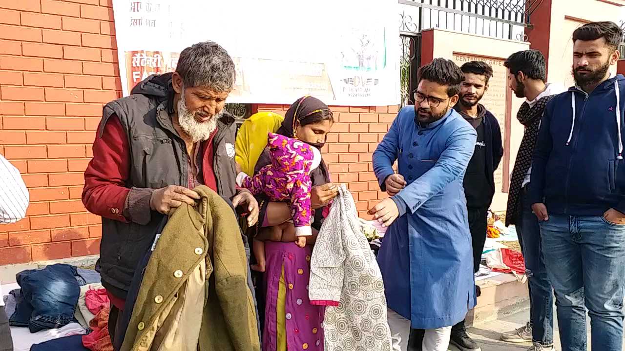 Free cloth distribution to poors by AMU Students.