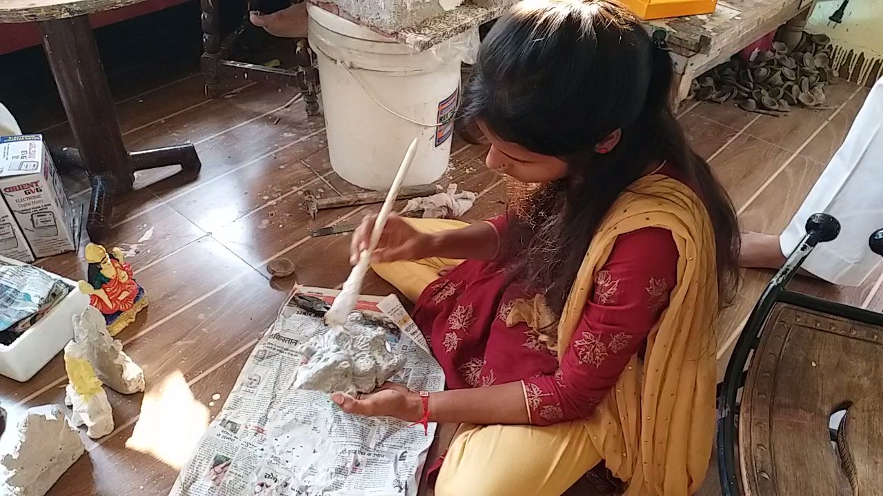 Laxmi-Ganesh being made from cow dung