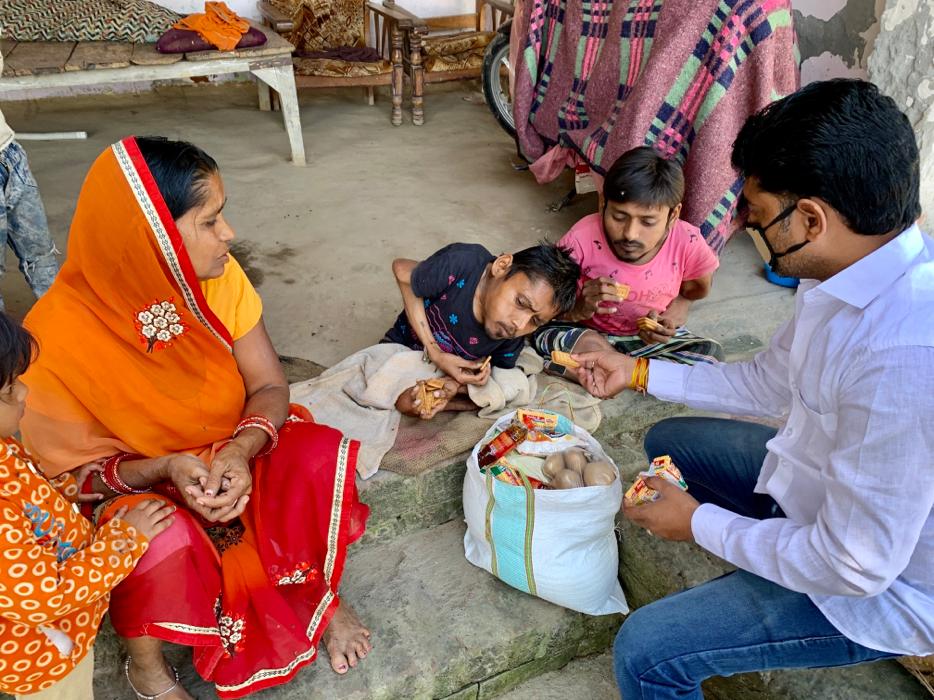 distributing food in basti