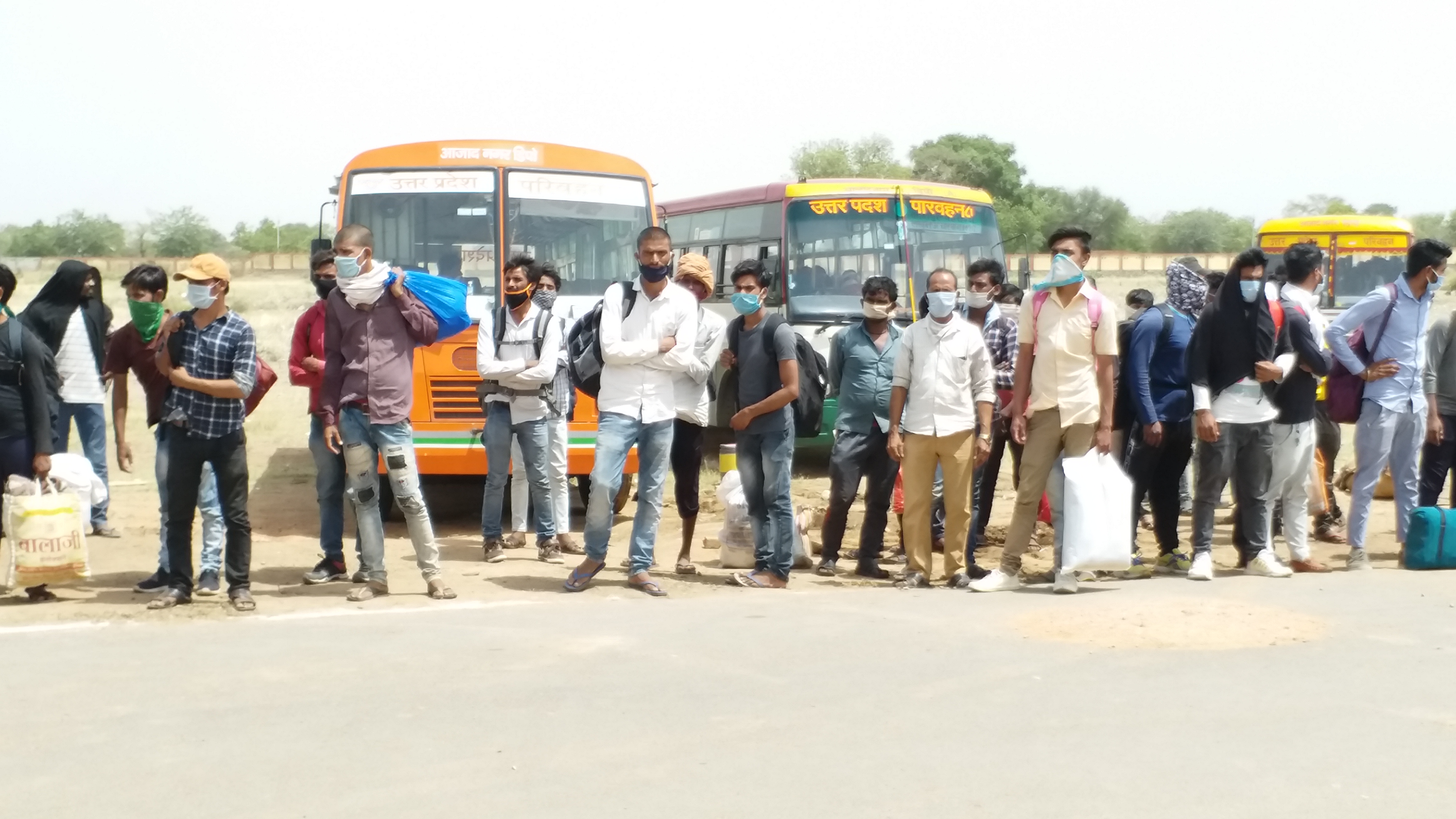 laborers are waiting for buses to go to home in jhansi uttar pradesh