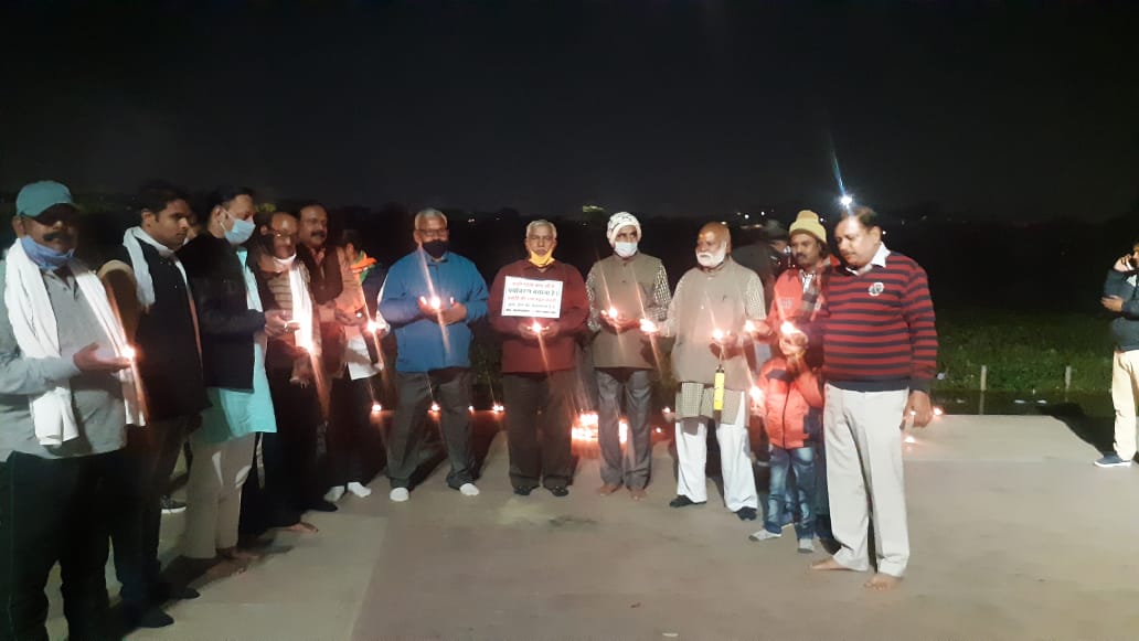 lamps were lit on banks of river gomti in lucknow