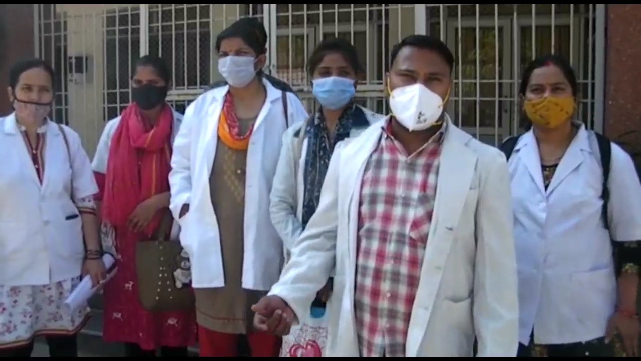 Meerut: Angry nurses protest outside the district magistrate's office