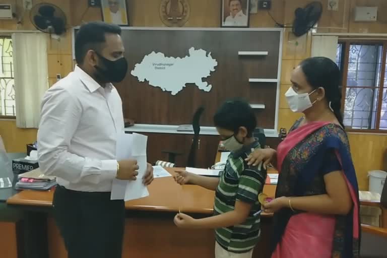 District collector awards government job for a widow