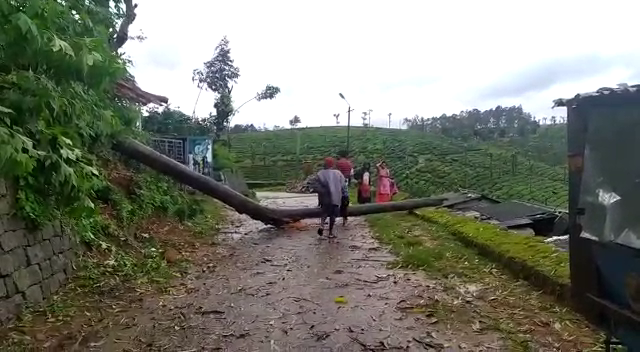 kovai-in-valparai-heavy-rain-with-storm-damages-house-and-causes-the-power-cut