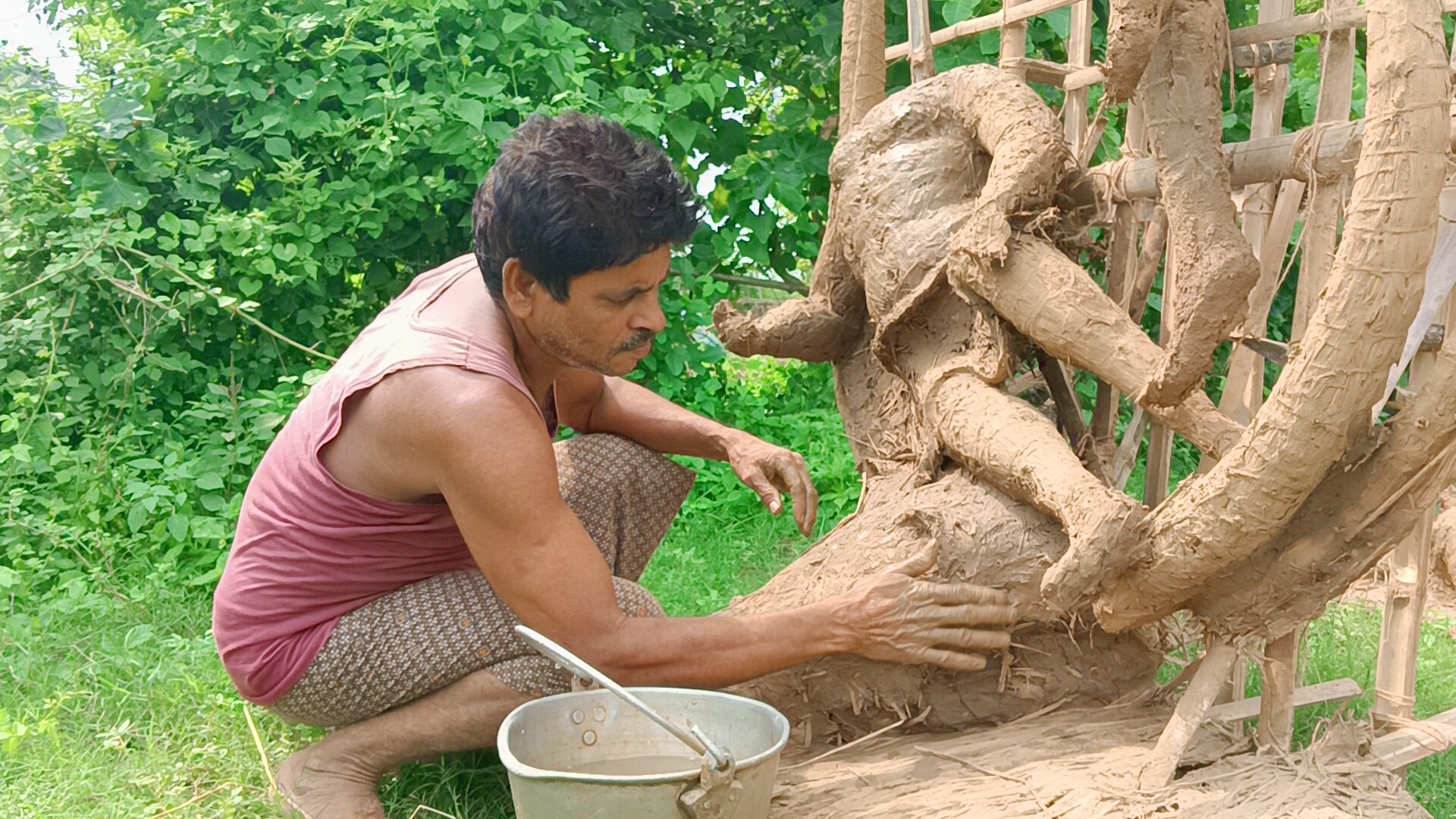 specially abled Bikash Bishal making idols since 30 years in Jhargram