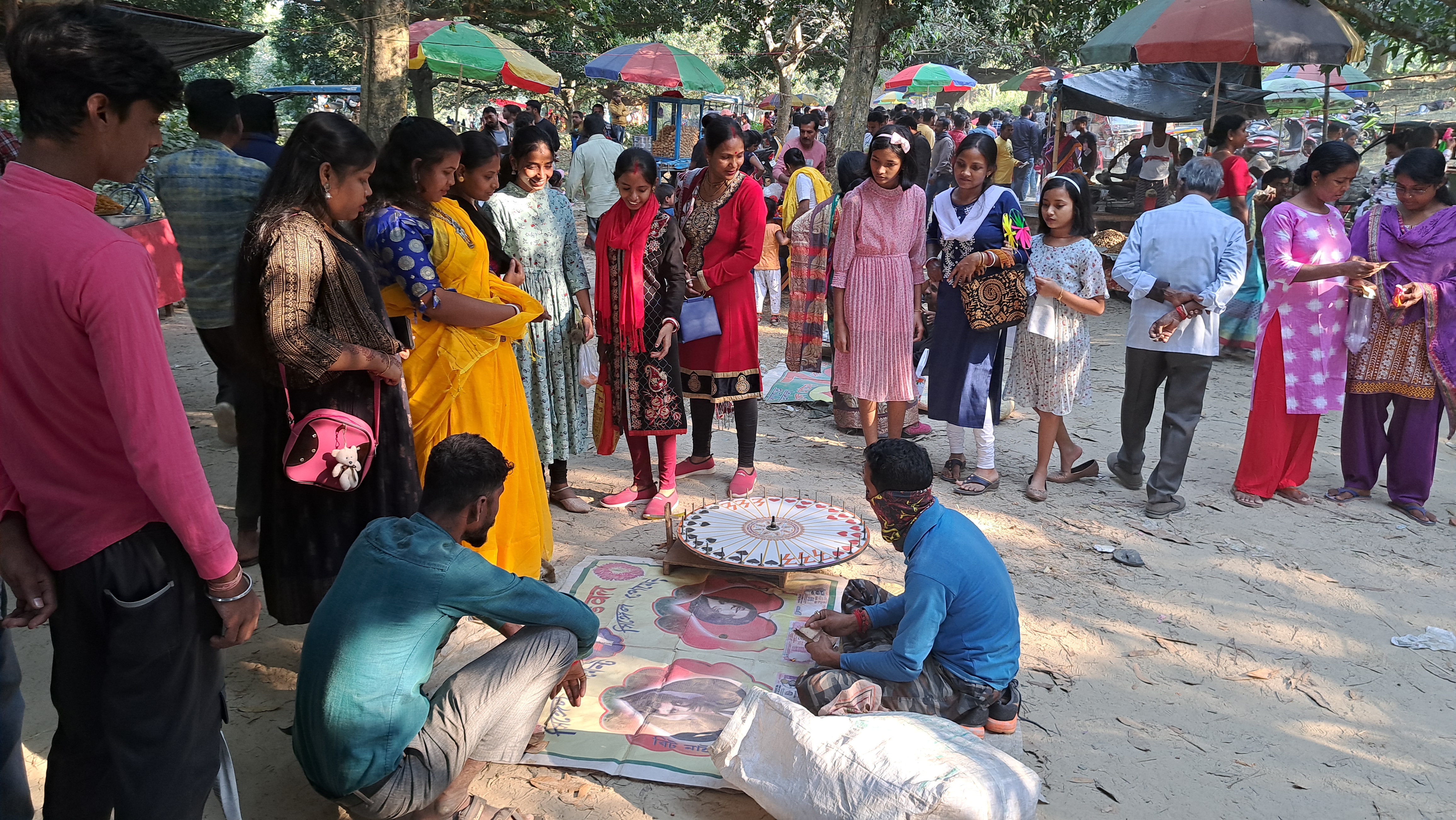 West Bengal unique festival where children walk into the fair ground with their parents to gamble