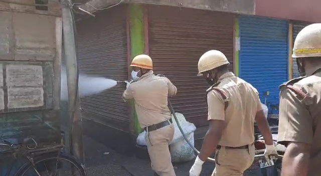 Raiganj firebrigade against corona, sanitizer finyle sprayed in markets