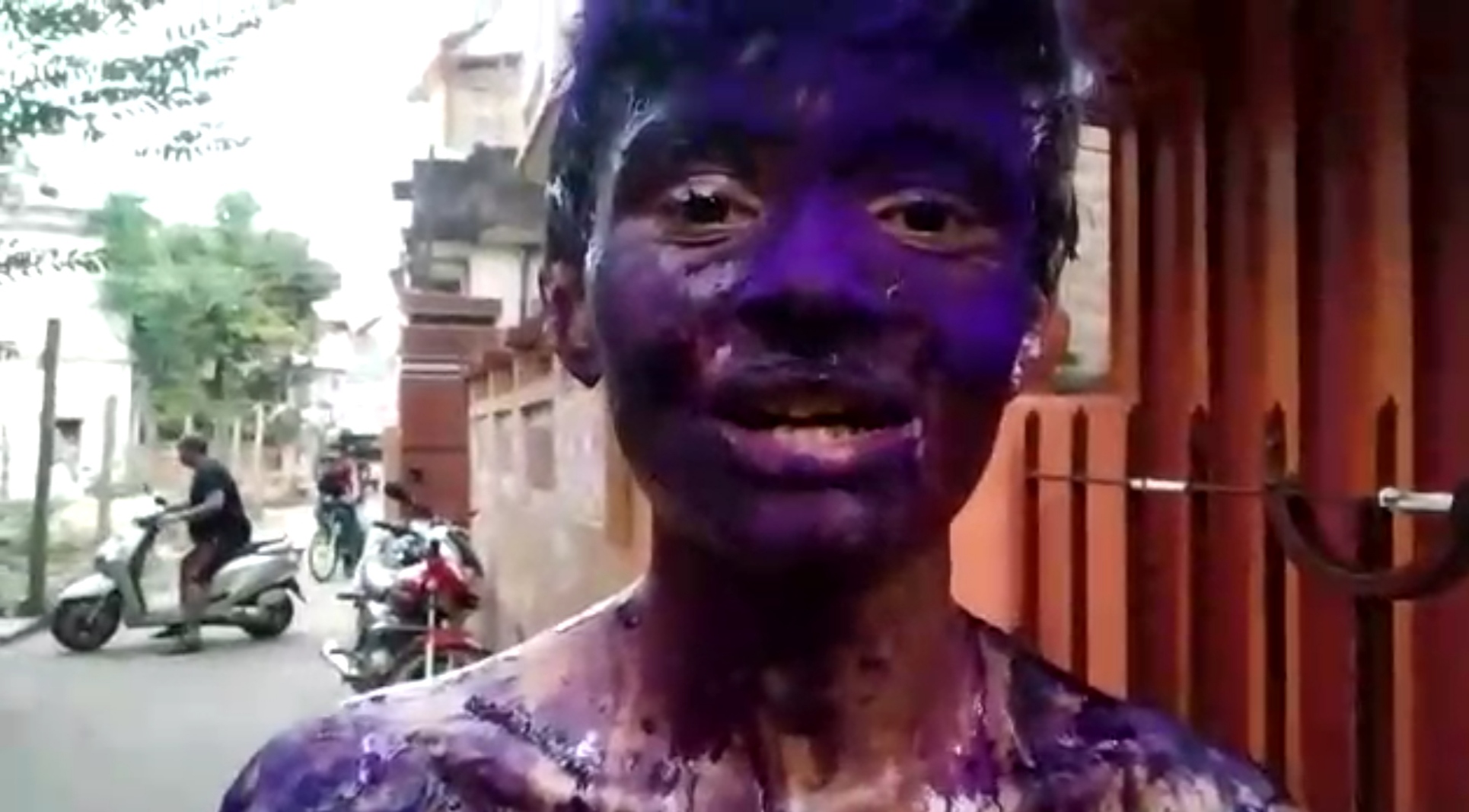 friends-celebrate-boys-birthday-by-spraying-black-ink-on-face-make-him-parade-with-tied-hands