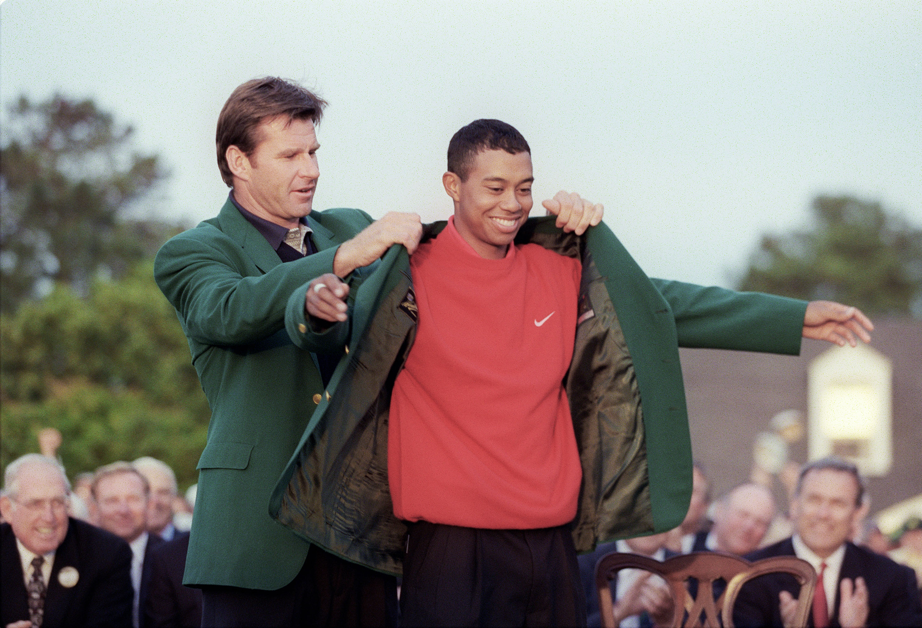 Tiger Woods wearing his first Green Jacket after his 1997 Masters Championship title win.