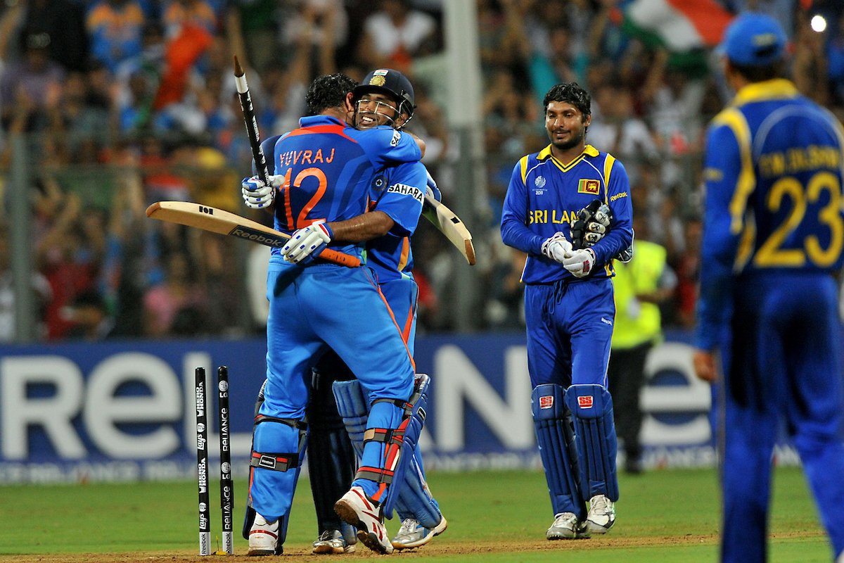 Yuvraj Singh celebrates India's 2011 World Cup victory with MS Dhoni at the Wankhede stadium.